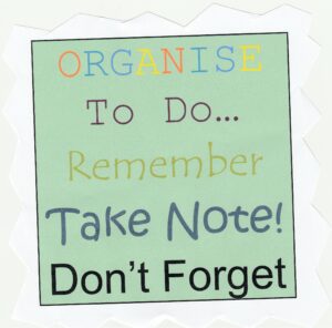 Note reading 'Don't forget' to aid self-organisation