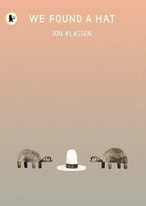 Book jacket of children's book We Found A Hat by Jon Klassen