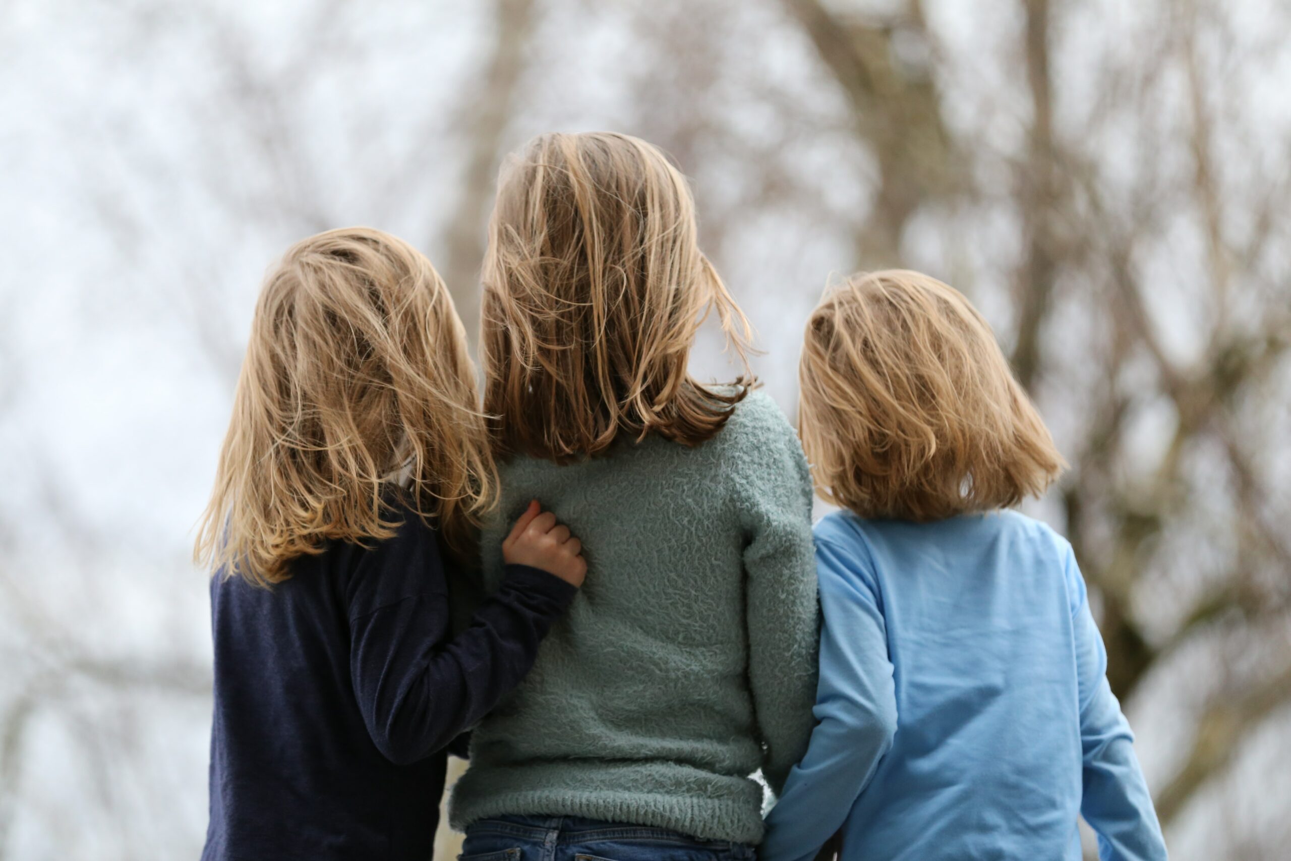 three girls in a friendship group - ideas for helping children manage friendship problems