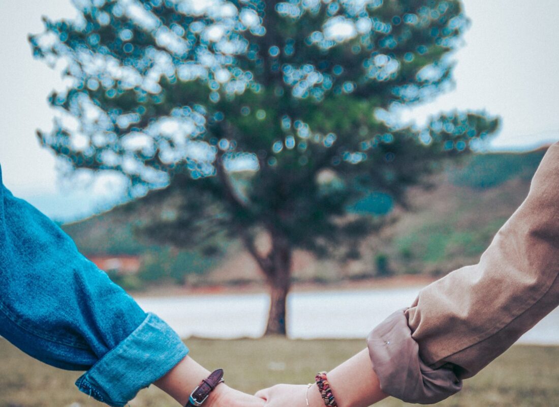 Parenting as a team - two people holding hands