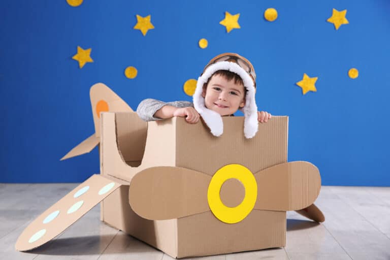 parenting support for working parents, photo of child playing in a box