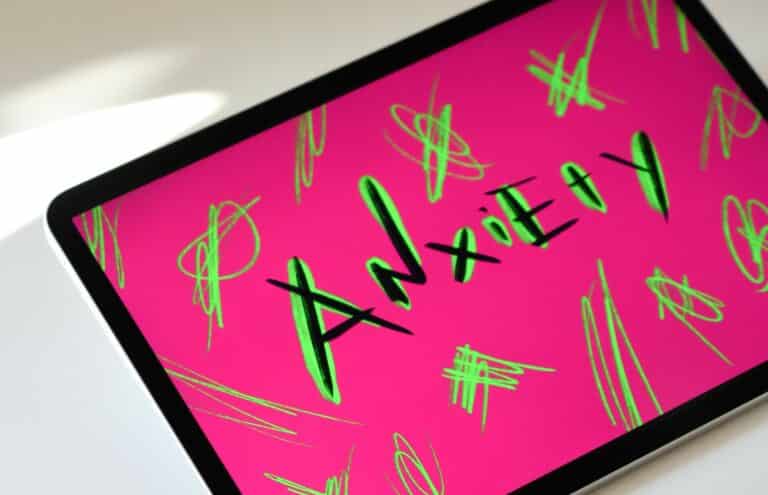 photo of tablet with the word 'Anxiety' written on it to illustrate support for parents of children with anxiety