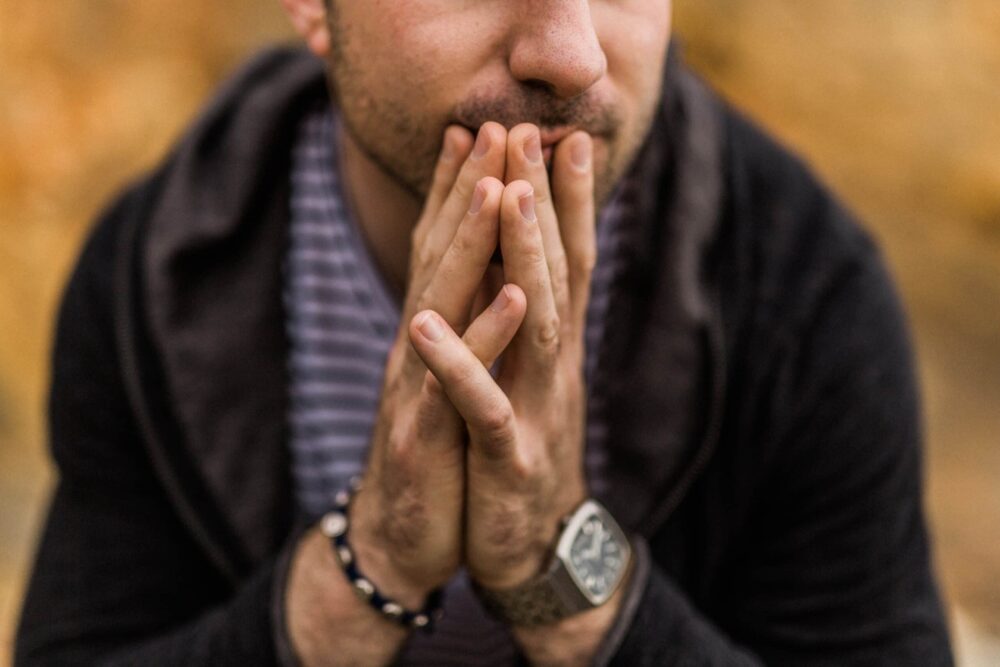 photo of worried man to illustrate parenting seminar on parental anxiety