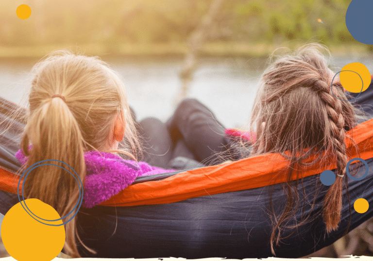 photo of two young girls relaxing in a hammock to illustrate article on how to have better weekends with children