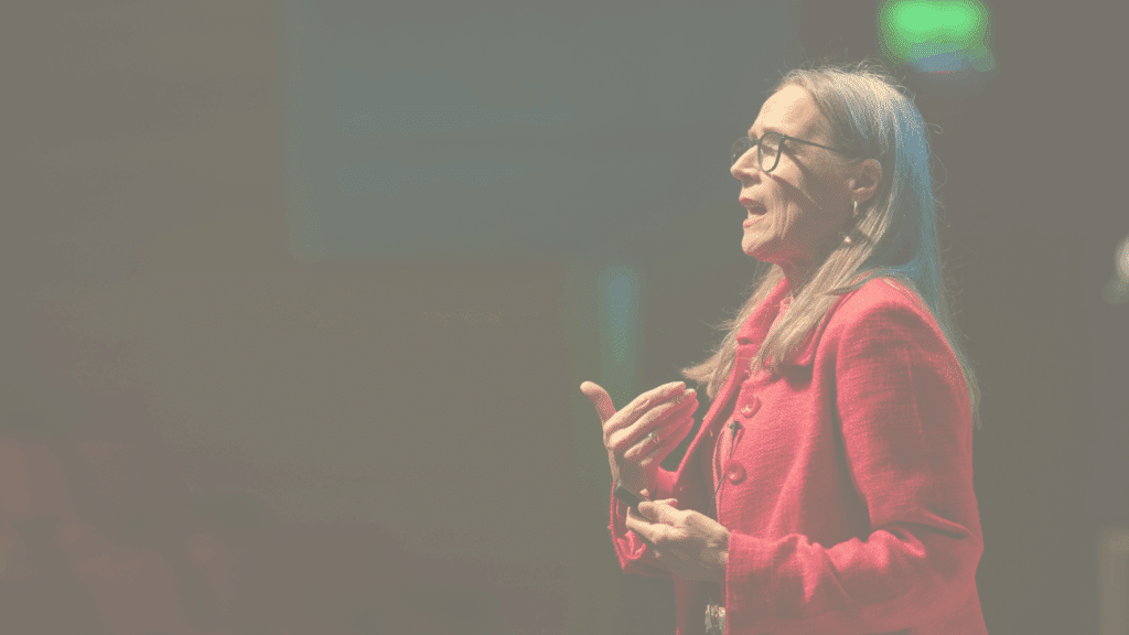 Photo of parenting expert Anita Cleare delivering a keynote speech on sta
