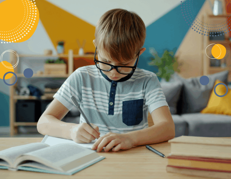 photo of young boy studying to illustrate article on "Should I get a tutor for my child?"